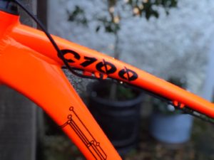 c100 bike orange